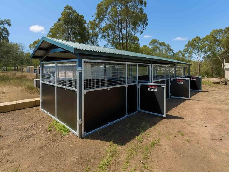 Modern outdoor horse stables in rural Australia.