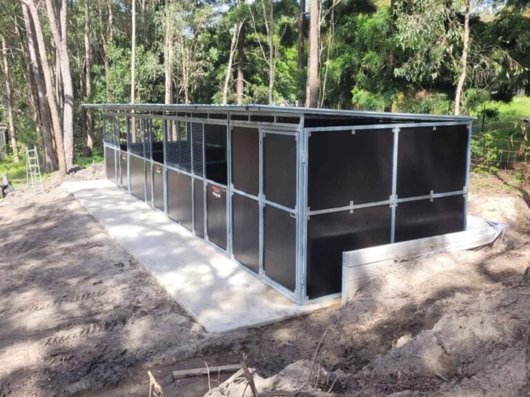 modular horse stables with pitched roof and airflow mesh panels – captures weather-proof design and strong build.