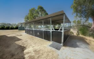 Horse stable in sunny Australian landscape