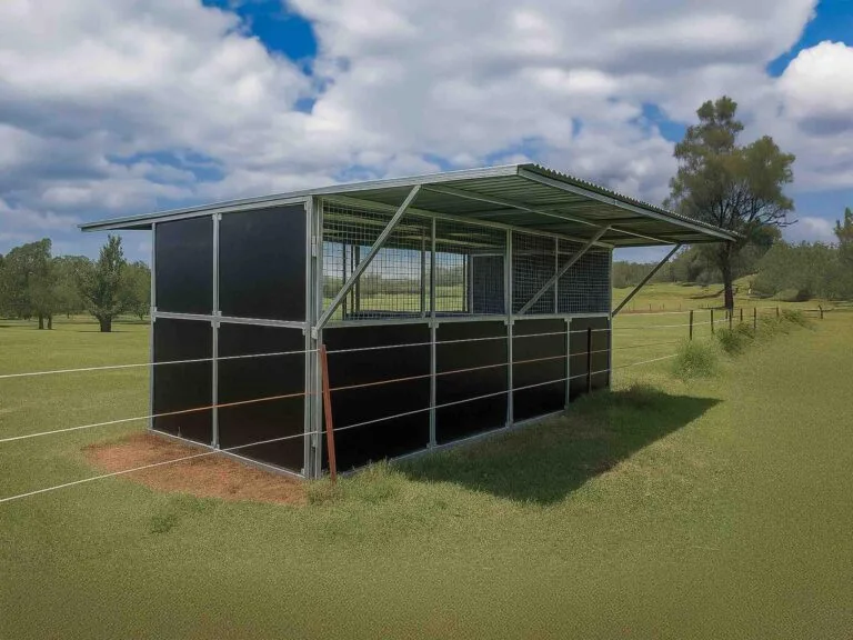 Horse shelter in a grassy field