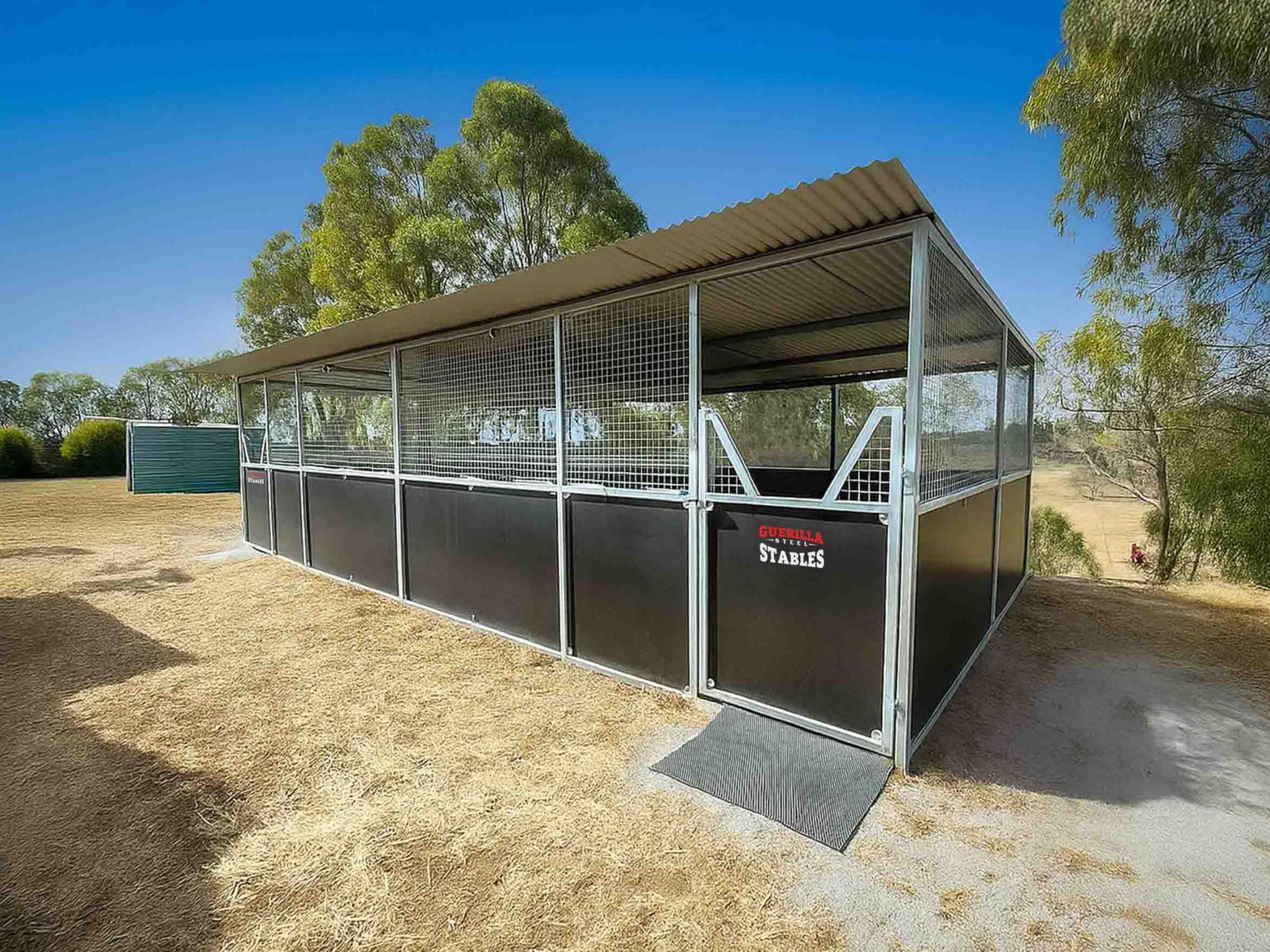 Outdoor horse stables on sunny day in Australia.
