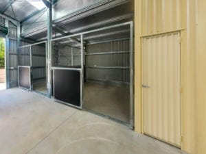 Optimised metal shed interior with storage.
