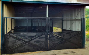 modern black x brace horse stable front elevation modular steel construction