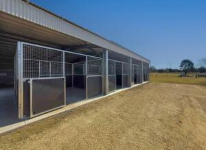 Exterior view of rural horse stables.