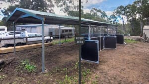 Before and after comparison showing a basic open shelter upgraded with Guerilla Steel’s welded triple-bay stable panels, demonstrating the strength and finish of a local Australian retrofit.