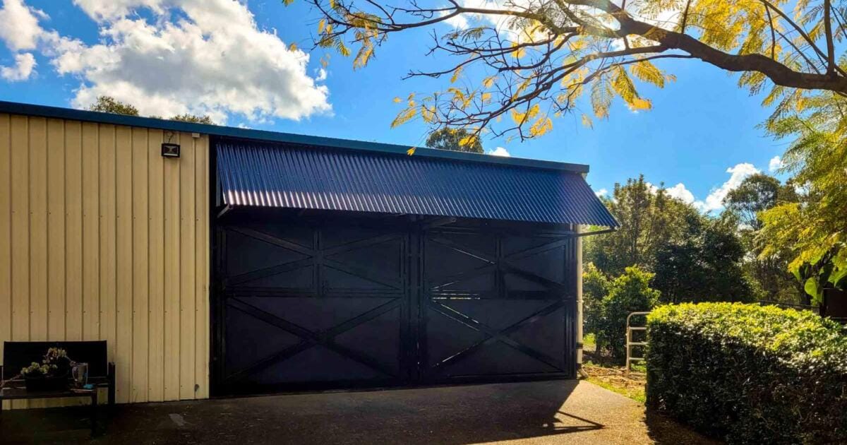 Garage with black stable upper Dutch gates - Stable Shed Retrofit