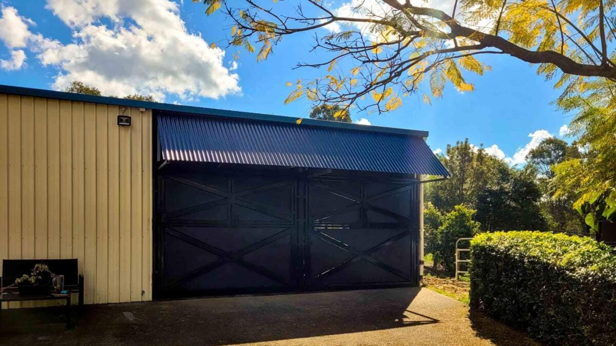 Garage with black stable upper Dutch gates - Stable Shed Retrofit