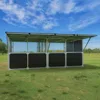 Modular solar-powered generator in open field.
