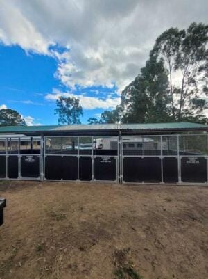 Horse stables retrofit pergola-stable conversion with three bays and reinforced structural joints, photographed on-site in Buccan, Logan City.