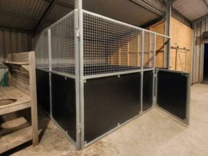 horse stable retrofit installed inside existing farm shed with ply and mesh panels