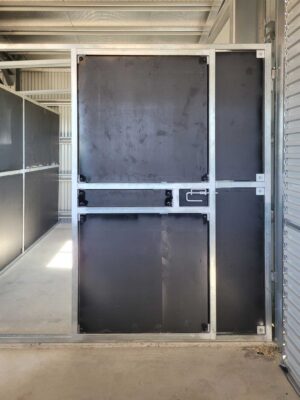 heavy duty steel horse stable gate with solid kick panels inside shed