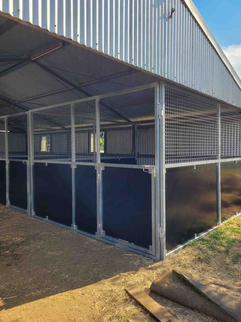 retrofit horse stable system installed inside existing farm shed structure