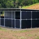 completed 3 bay modular horse stable integrated with shipping container and roof extension