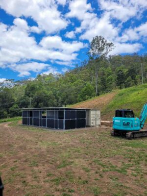 3 bay modular horse stable installation on sloping Queensland hinterland property