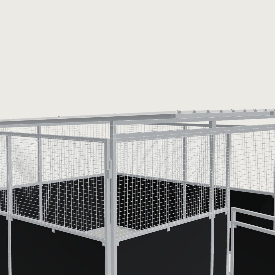 Guerilla Steel Stables standard base stable, 4 × 4 m inside, galvanised 50×50 SHS panels with black ply lower, welded mesh upper, 1500 × 1200 mm swing gate with slam latch, white Trimdek roof with 900 mm front overhang, high airflow raisers lifting the front of the roof 200 mm.