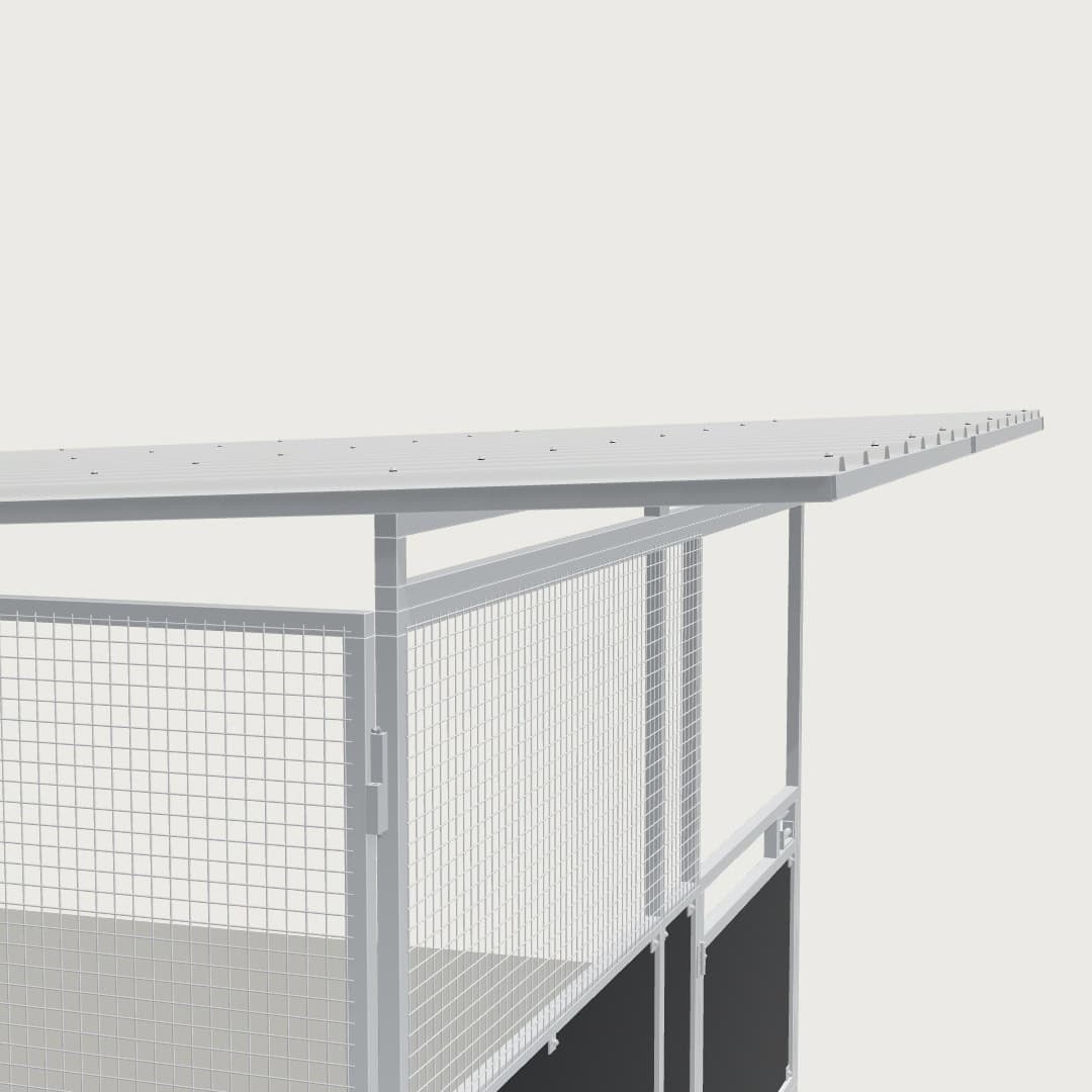 Guerilla Steel Stables standard base stable, 4 × 4 m inside, galvanised 50×50 SHS panels with black ply lower, welded mesh upper, 1500 × 1200 mm swing gate with slam latch, white Trimdek roof with 900 mm front overhang, high airflow raisers lifting the front of the roof 200 mm.